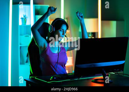 Happy Pretty Blonde Gamer Girl Playing Online Video Game on Her Personal  Computer Stock Photo - Alamy