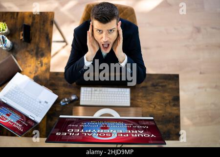 Ransomware Malware Cyber Attack On Business Computer Stock Photo