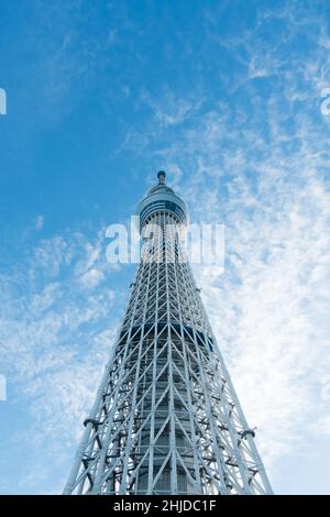 View of Tokyo Skytree from below with blue sky behind Stock Photo