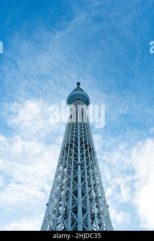 View of Tokyo Skytree from below with blue sky behind Stock Photo