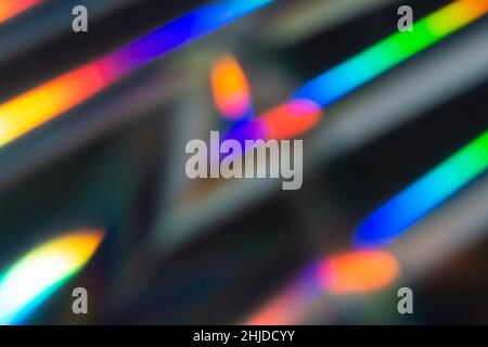 Abstract blurred defocused background with diagonal neon light leaks. Stock Photo