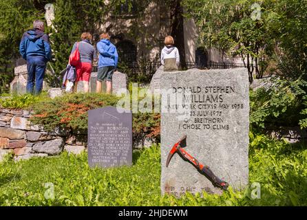 ZERMATT, SWITZERLAND - Memorial headstone with ice ax for climber Donald Stephen Williams,  Mountaineers' Cemetery, mountain climbers graveyard. Stock Photo