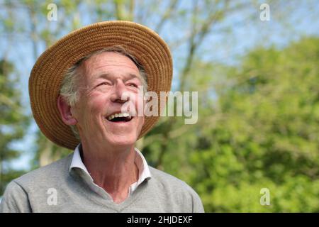 Beautiful old man outside Stock Photo