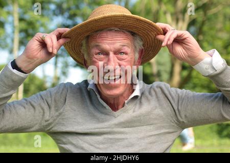 Beautiful old man outside Stock Photo