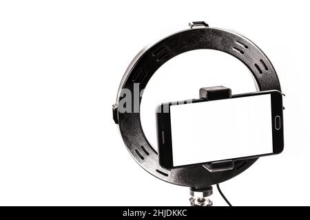 Ring Light template tripe with isolated white background, smartphone shooting horizontal with space for text or photo. Stock Photo