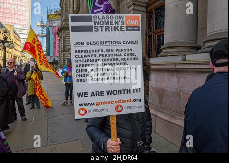 Glasgow, UK. 27th Jan, 2022. A member of the workers union GMB Scotland is seen covering her face with a placard during the protest. Credit: SOPA Images Limited/Alamy Live News Stock Photo