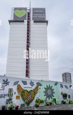 Grenfell Tower and Memorial Wall, commemorating those who died in the fire of June 2017 as a result of aluminium cladding, North Kensington, London