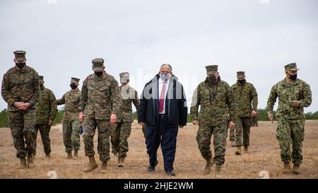 Camp Lejeune, United States. 28th Jan, 2022. U.S. Secretary of the Navy Carlos Del Toro walks with the officers of the Marines of 1st Battalion, 6th Marine Regiment, 2d Marine Division, during a visit to the live fire range, January 28, 2022 at Camp Lejeune, North Carolina. Credit: LCpl. Ryan Ramsammy/US Marines/Alamy Live News