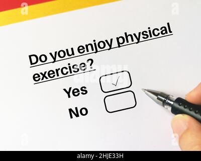 One person is answering question about health problem. The person enjoys physical exercise. Stock Photo