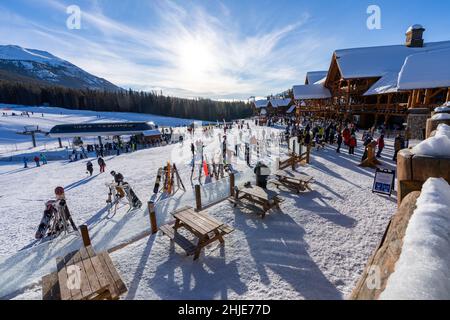 Lake Louise, Alberta, Canada - January 27 2022 : Lake Louise Ski Resort in a winter sunny day, during covid-19 pandemic period. Stock Photo