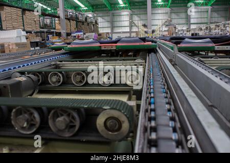 The chain and shaft drive Line Conveyor Stock Photo