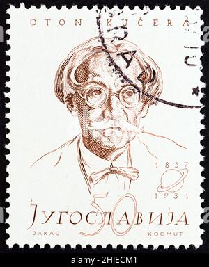 YUGOSLAVIA - CIRCA 1957: A stamp printed in Yugoslavia from the 'Personalities' issue shows Oton Kucera (physicist, birth centenary), circa 1957. Stock Photo