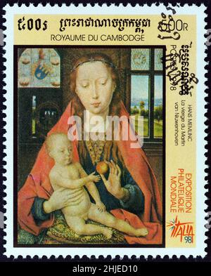 CAMBODIA - CIRCA 1998: A stamp printed in Cambodia shows Madonna of Martin van Niuwenhoven (Hans Memling), circa 1998. Stock Photo