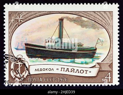 USSR - CIRCA 1976: A stamp printed in USSR from the 'Soviet Ice Breakers' issue shows Icebreaker Pilot, circa 1976. Stock Photo