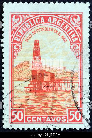 ARGENTINA - CIRCA 1936: A stamp printed in Argentina shows Oil well, circa 1936. Stock Photo