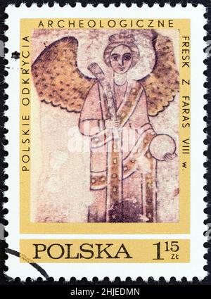 POLAND - CIRCA 1971: A stamp printed in Poland from the 'Fresco. Discoveries made by Polish Expedition at Faras, Nubia' issue shows Archangel Michael. Stock Photo