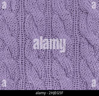 light purple knitted background from natural material. close-up surface, concept color of 2022. Stock Photo