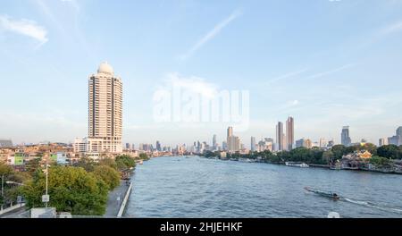 Bangkok / Thailand - December 30 2021: View from Chao Phraya Sky Park, Chao Phraya River close to Phra Pokklao Bridge in, Thonburi, Bangkok, Thailand. Stock Photo