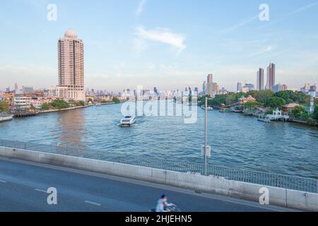 Bangkok / Thailand - December 30 2021: View from Chao Phraya Sky Park, Chao Phraya River close to Phra Pokklao Bridge in, Thonburi, Bangkok, Thailand. Stock Photo