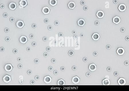 Metal hexagon nuts as background or texture. Abstract pattern. Top view Flat lay. Stock Photo