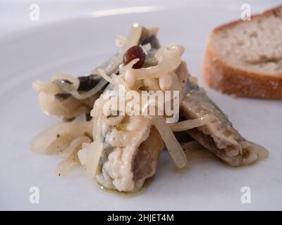 Sarde in Saor, Venetian Marinated Sardines with Onion, Raisins and Pine Nuts from Venice, Italy