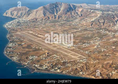 Santorini, Greece - August 4, 2021: Overview of Santorini airport (JTR) aerial photo in Greece. Stock Photo