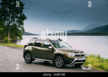 Kroderen, Norway. Car Renault Duster SUV Parked Near Lake Kroderen In Norwegian Countryside Landscape. Kroderfjorden In Municipality Of Krodsherad In Stock Photo