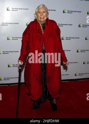 **FILE PHOTO** Joni Mitchell To Remove Songs From Spotify In Support Of Neil Young. Singer-songwriter Joni Mitchell arrives for the Medallion Ceremony honoring the recipients of the 44th Annual Kennedy Center Honors at the Library of Congress in Washington, DC on Saturday, December 4, 2021. The 2021 honorees are: operatic bass-baritone Justino Diaz, Motown founder, songwriter, producer and director Berry Gordy, ‘Saturday Night Live' creator Lorne Michaels, legendary stage and screen icon Bette Midler, and singer-songwriter Joni Mitchell. Credit: Ron Sachs/Pool via CNP /MediaPunch Stock Photo