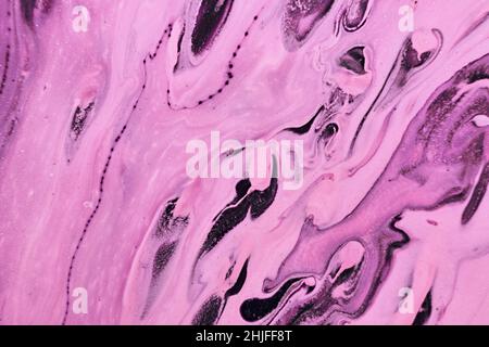Fluid Art. Pink and purple abstract waves. Marble effect background or texture. Stock Photo