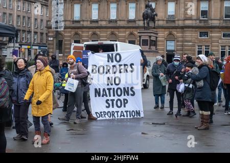 Glasgow, Scotland, UK. 29th January, 2022. Campaigners gather in George Square to protest against the Nationality and Borders Bill which is currently being debated in the Westminster Parliament. Credit: Skully/Alamy Live News Stock Photo