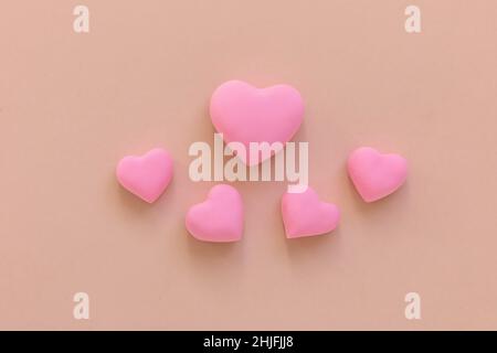3d pink hearts creative arrangement. Concept of love, romantic relationship, heart shape symbol, simple layout, celebration of  Valentine's Day, weddi Stock Photo