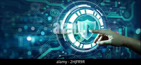 Double Exposure of Night City and Data protection Cyber Security Privacy Hologram. Businessman hand pointing the information or Network protection. Stock Photo