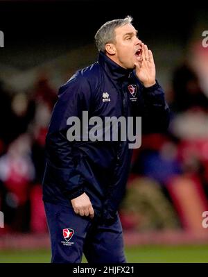 Cheltenham Town manager Michael Duff shouts from the touchline during the Sky Bet League One match at The Jonny-Rocks Stadium, Cheltenham. Picture date: Saturday January 29, 2022. Stock Photo