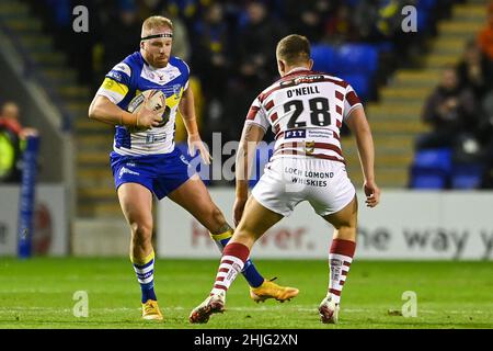 Oliver Holmes (12) of Warrington Wolves in action Stock Photo