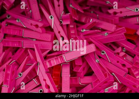 View of several decorative scattered pinned colorful push pins isolated on a white background. Selective focus. Stock Photo