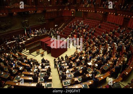 Rome, Italy. 29th Jan, 2022. Members of Italy's parliament celebrate after Italian President Sergio Mattarella was elected to a second term at the end of the eighth round of voting in Rome, Italy, on Jan. 29, 2022. Italian President Sergio Mattarella was elected to a second term by the parliament gathered in a joint session in the eighth round of voting on Saturday. Credit: Str/Xinhua/Alamy Live News Stock Photo