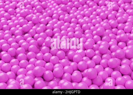 Ball pool or pit filled with pink plastic balls, abstract texture background, selective focus, 3D illustration Stock Photo