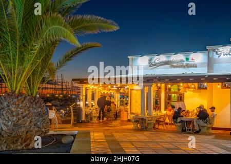 View of restaurants after sunset in Marina Rubicon, Playa Blanca, Lanzarote, Canary Islands, Spain, Atlantic, Europe Stock Photo