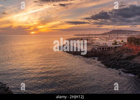 View of sunset over ocean and Rubicon Marina, Playa Blanca, Lanzarote, Canary Islands, Spain, Atlantic, Europe Stock Photo