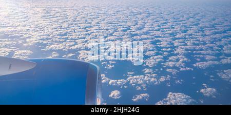 View of airplane engine and clouds over the sea, Atlantic Ocean, Europe Stock Photo