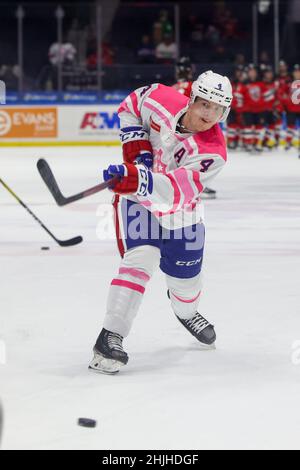 Rochester, New York, USA. 29th Jan, 2022. Rochester Americans defenseman Jimmy Schuldt (4) takes a shot on net during warm ups against the Utica Comets The Rochester Americans hosted the Utica Comets on Pink in the Rink night in an American Hockey League game at the Blue Cross Arena in Rochester, New York. (Jonathan Tenca/CSM). Credit: csm/Alamy Live News Stock Photo