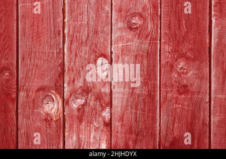 Front View of Vertical Patterned Carnelian Red Grunge Wooden Wall Texture Stock Photo