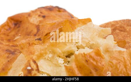 Placinta cake filled with a soft cheese as a romanian cuisine. Can be used as a whole background. Stock Photo