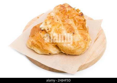 Placinta cake filled with a soft cheese as a romanian cuisine. Isolated on a white background. Stock Photo