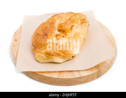 Placinta cake filled with a soft cheese as a romanian cuisine. Isolated on a white background. Stock Photo