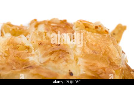 Placinta cake filled with a soft cheese as a romanian cuisine. Can be used as a whole background. Stock Photo