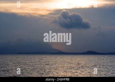 Stormy clouds over the sea Stock Photo