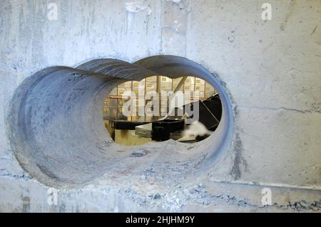 2015: File photo dated April 2015 of the tunnel leading into the vault at the Hatton Garden Safe Deposit company in London which was drilled by robbers over the Easter weekend who stole jewellery and valuables worth an estimated 14 million pounds. Issue date: Sunday January 30, 2022. Stock Photo