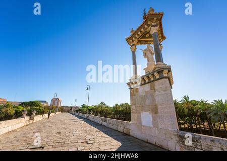 View of Puente del Mar (Sea Bridge) in Valencia with copy space. On the right side, there is a statue of San Pascual Bailon (1940) by Jose Ortells Stock Photo