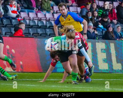 London, UK. 29th Jan, 2022. Twickenham Stoop, London, England, January 29th 2022 Freya Aucken (15 - Harlequins Women) slips out of the tackle in the match between Harlequins Women and Gloucester-Hartpury Women in Round 12 of the Allianz Premier 15s at the Twickenham Stoop on Saturday 29th January 2022 Claire Jeffrey/SPP Credit: SPP Sport Press Photo. /Alamy Live News